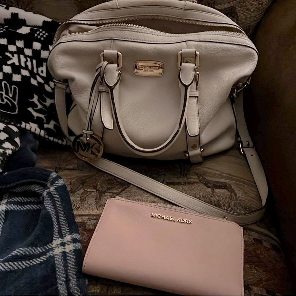 Michael Kors leather purse and wallet set.